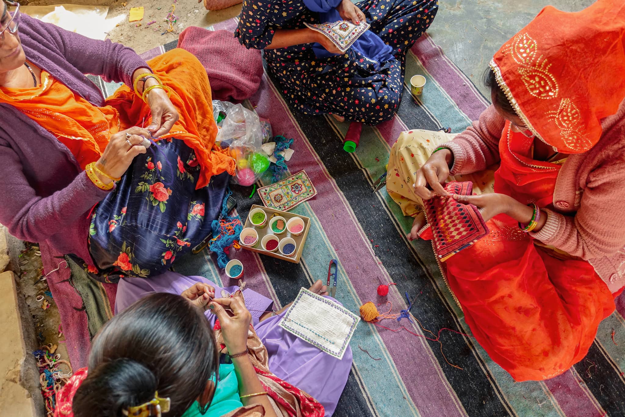 Women embroidering in India