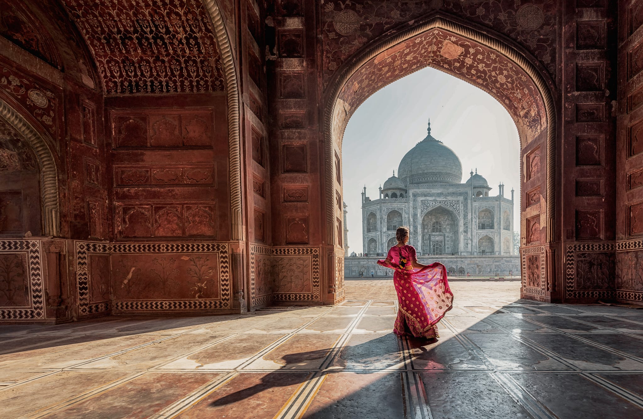 Indian market with colorful textiles and traditional architecture