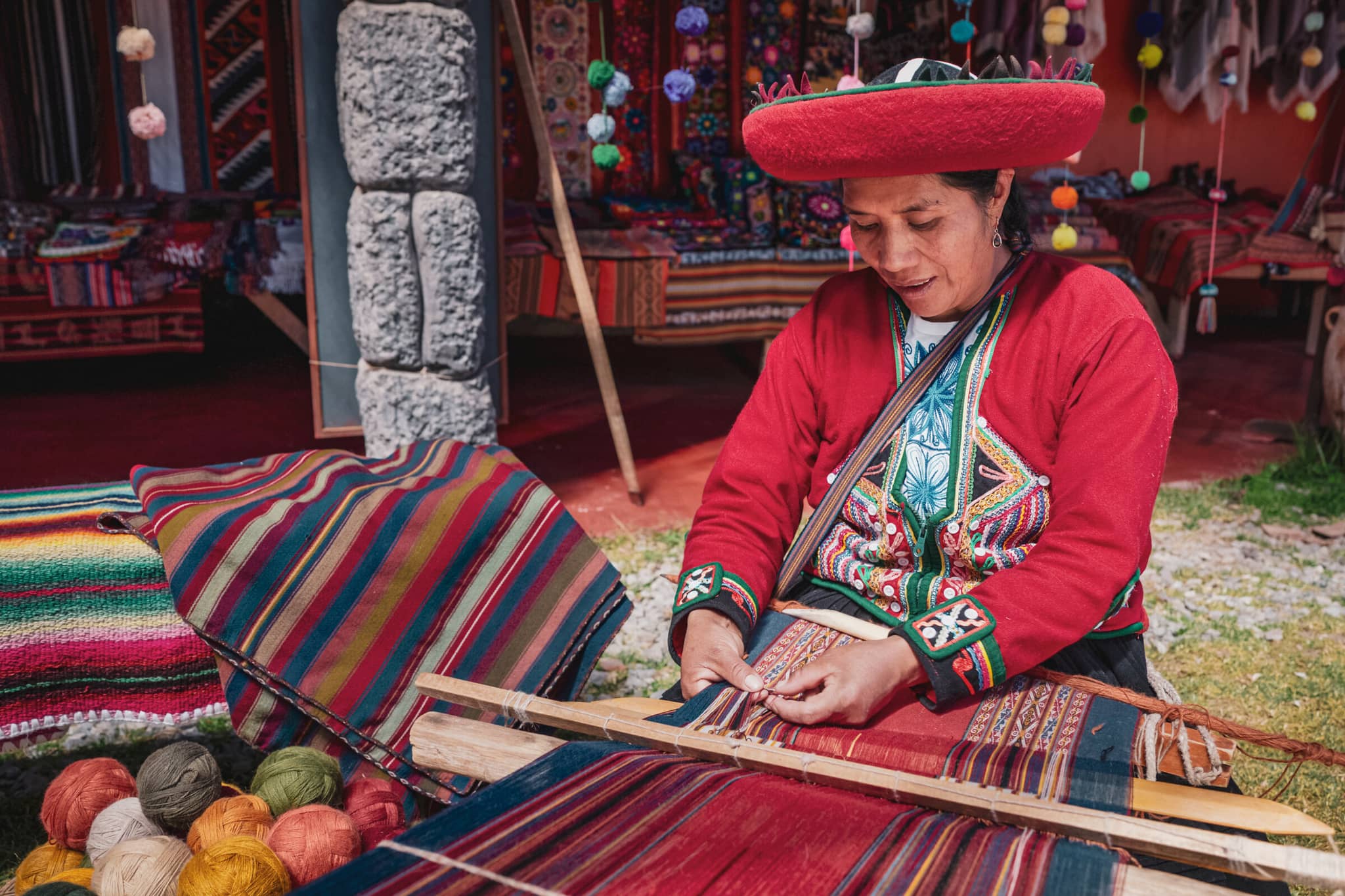 Machu Picchu & the Urubamba gallery 01 Galleryhero weavingperu GettyImages 2200732123 hadynyah