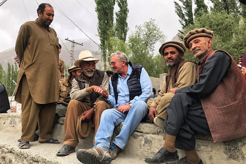 Bill Jones Chatting with locals in Shigar 800x535 1