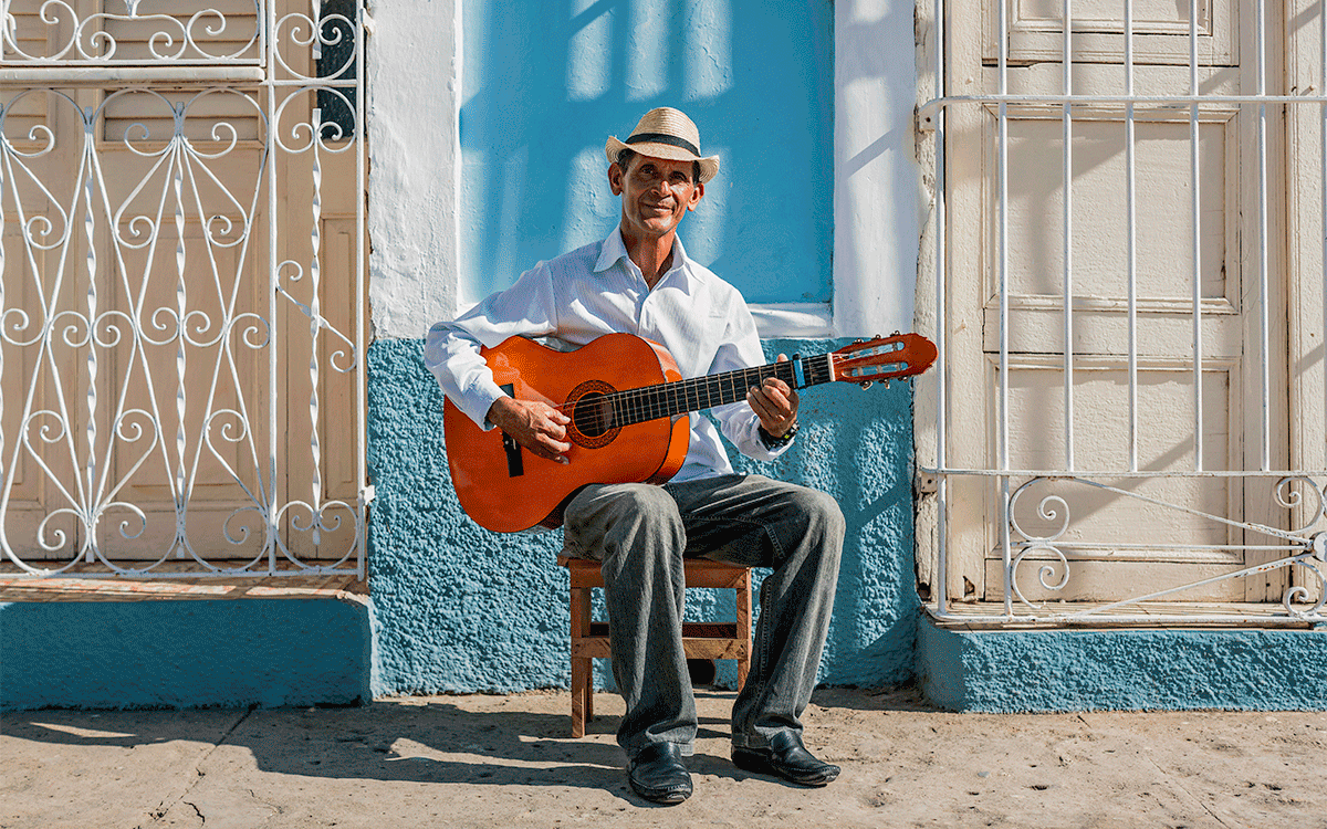 Portrait of guitar player in Cuba