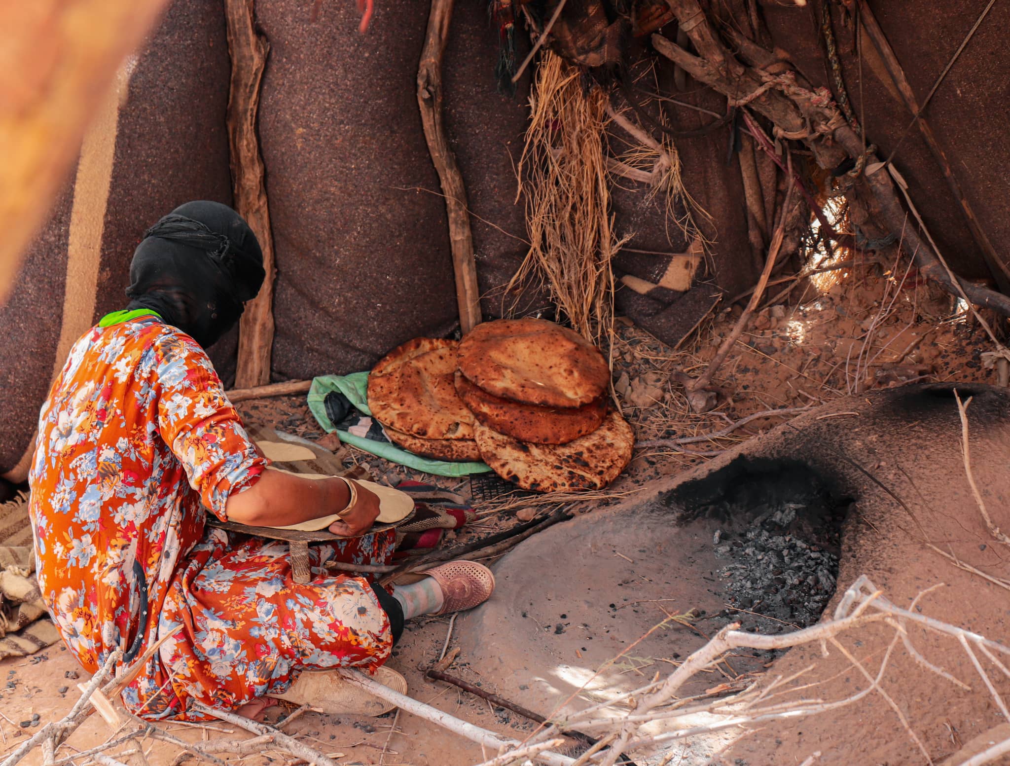 Moroccan local berber preparing traditional flatbread