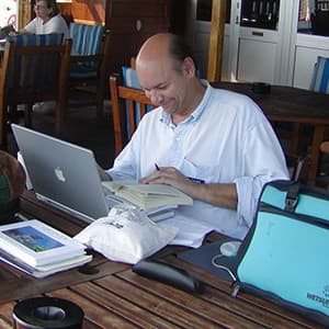 galapagos don george writing aboard ship